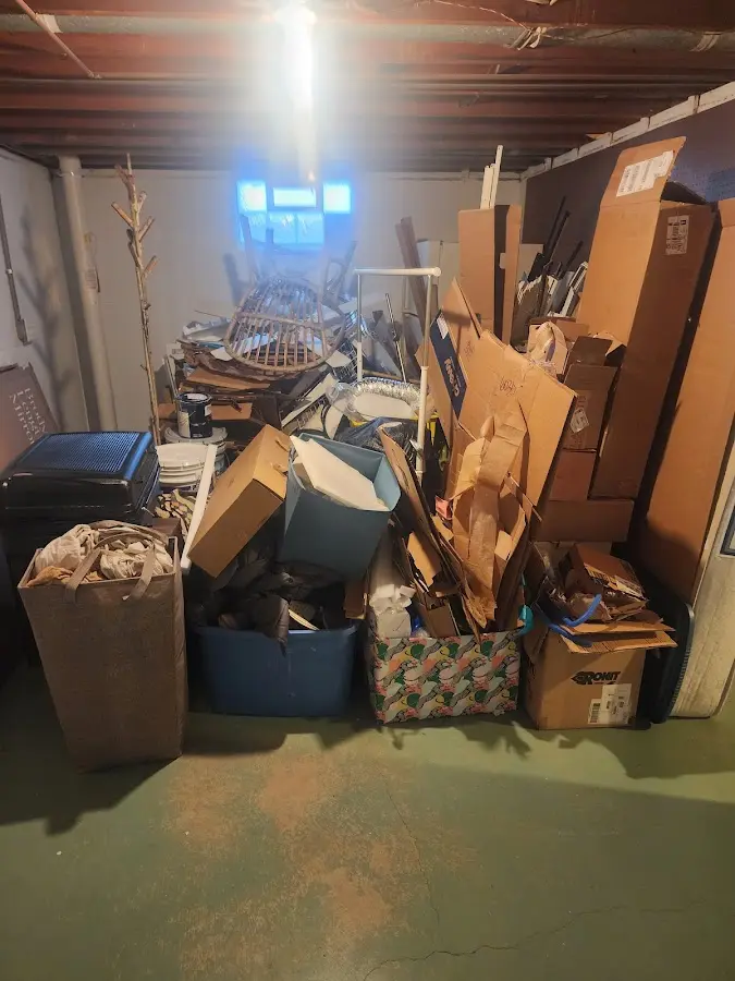 Roll-off dumpster container at job site for Yard Waste Dumpster Rental in Cold Spring